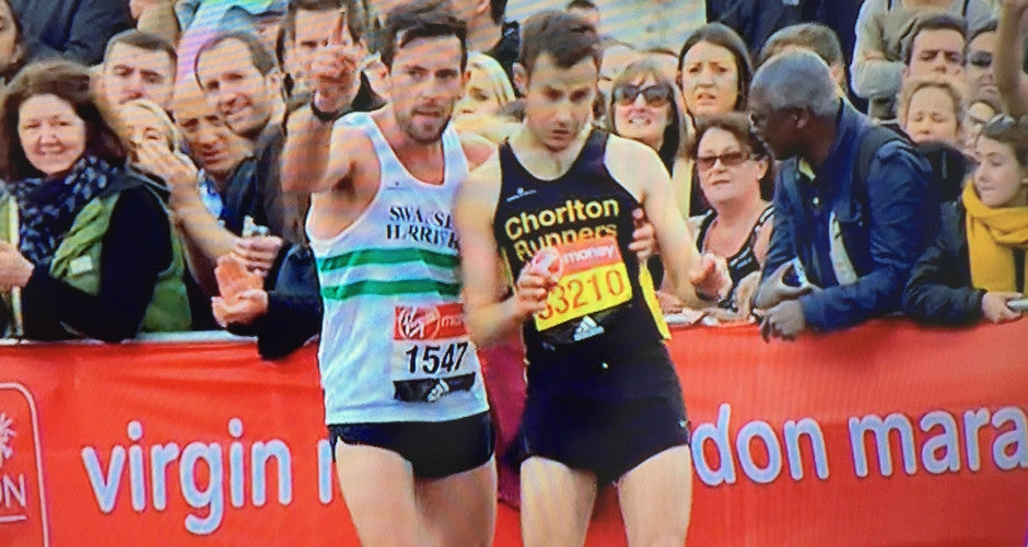 Runner suffering at the end of London marathon