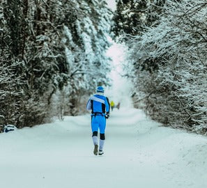 Man running in the snow